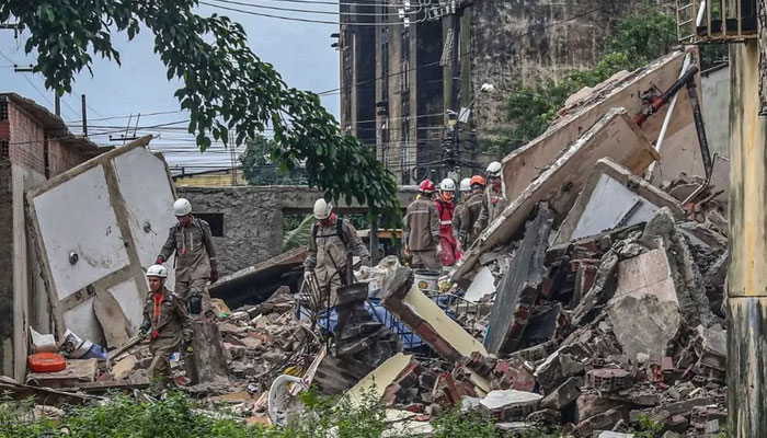 This picture shows rescuers clearing the rubble. — BBC/EPA/File