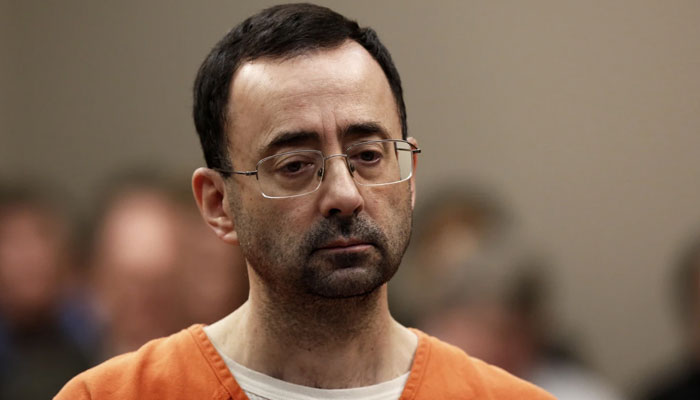 This representational picture shows former USA gymnastics doctor Larry Nassar in Ingham County Circuit Court in Lansing, Michigan, on Nov. 22, 2017. — AFP