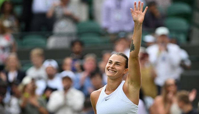 Belaruss Aryna Sabalenka celebrates winning against US player Madison Keys during their womens singles quarter-finals tennis match on the tenth day of the 2023 Wimbledon Championships at The All England Lawn Tennis Club in Wimbledon, southwest London, on July 12, 2023. — AFP