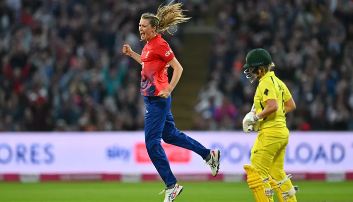 Lauren Bell celebrates the wicket of Ellyse Perry. — ECB