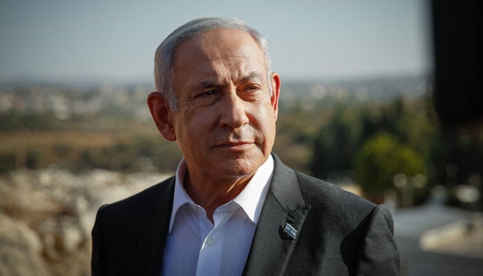 Israeli Prime Minister Benjamin Netanyahu arrives for a briefing near the Salem military post in the occupied West Bank on July 4, 2023. — AFP