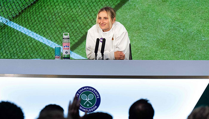Czech Republic´s Marketa Vondrousova speaks during a press conference in the Media Theatre in the Broadcast Centre after winning the women´s singles final tennis match against Tunisia´s Ons Jabeur on the thirteenth day of the 2023 Wimbledon Championships at The All England Lawn Tennis Club in Wimbledon, southwest London, on July 15, 2023.—AFP