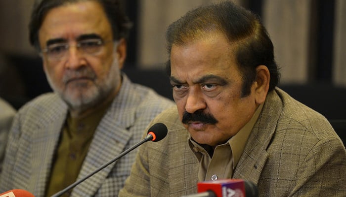 Pakistan Interior Minister Rana Sanaullah, center, speaks during a press conference in Islamabad on May 24, 2022. — AFP/File