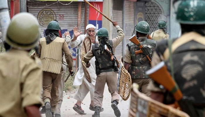 Indian occupation forces subject an old man to torture in Occupied Jammu and Kashmir. — Radio Pakistan/File
