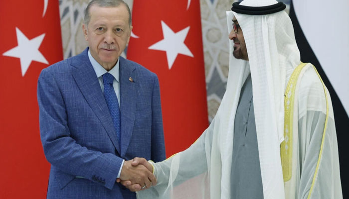 UAE President Mohamed bin Zayed Al Nahyan (R) greeting Turkeys President Recep Tayyip Erdogan. AFP/File
