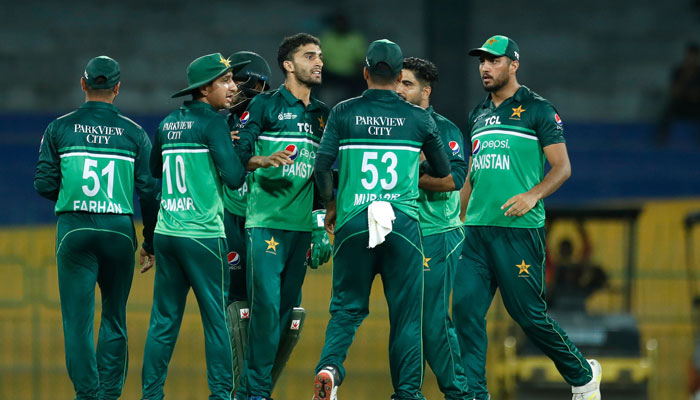 Pakistani players celebrate after dismissing an Indian batsman. — PCB