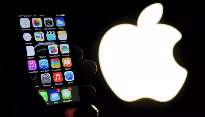 Undated file photo of an iPhone in front of the Apple logo. — AFP