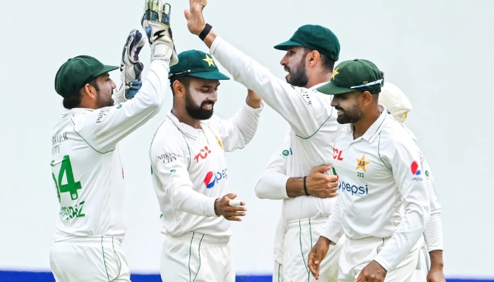 Pakistan players celebrate during the match. — AFP