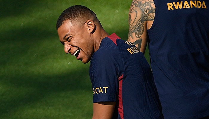 Paris Saint-Germain´s French forward Kylian Mbappe reacts as he takes part in a training session at the new campus of French L1 Paris Saint-Germain (PSG) football club at Poissy, some 30kms west of Paris on July 20, 2023, ahead of the club´s Japan tour.—AFP