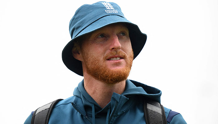England´s captain Ben Stokes arrives as rain delays the start of play on day five of the fourth Ashes cricket Test match between England and Australia at Old Trafford cricket ground in Manchester, north-west England on July 23, 2023.—AFP