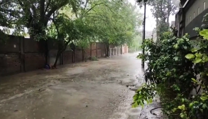 The view of a street filled with water during rain in Lahore on July 29, 2023 in this still from a video. — Twitter/@WeatherWupk