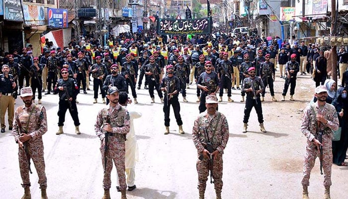 Security personnel high alert during the 10th Muharram procession to mark Ashoura at Qadamgah Moula Ali Road in Hyderabad on July 29, 2023. — APP