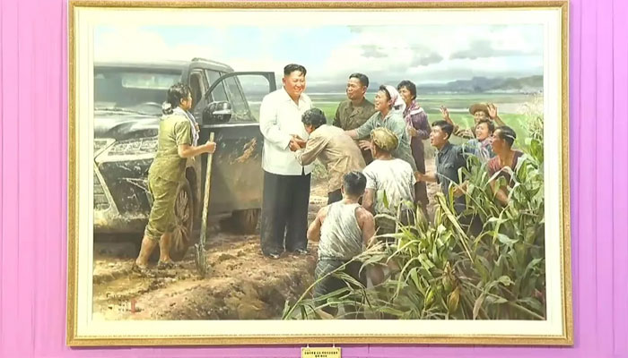 Kim Jong Un depicted meeting farmers and field workers in his country. — KCNA