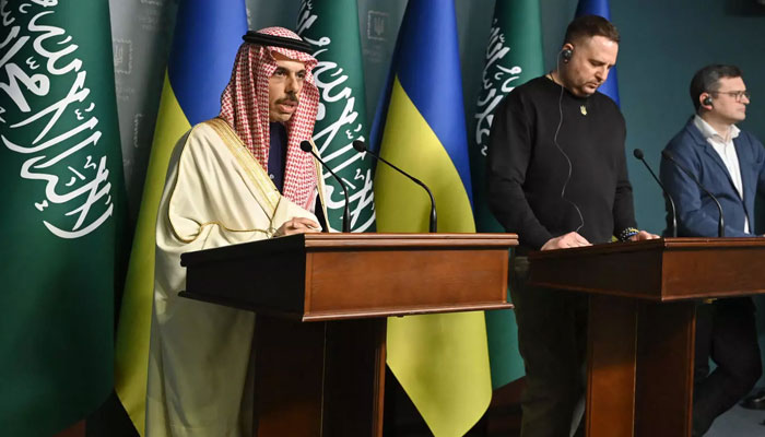 Saudi Arabias Minister of Foreign Affairs Prince Faisal bin Farhan Al-Saud (L) speaks during joint press conference with Head of the Office of the President of Ukraine Andriy Yermak (C) and Foreign Minister of Ukraine Dmytro Kuleba (R) in Kyiv on 26 February. (AFP/File photo)