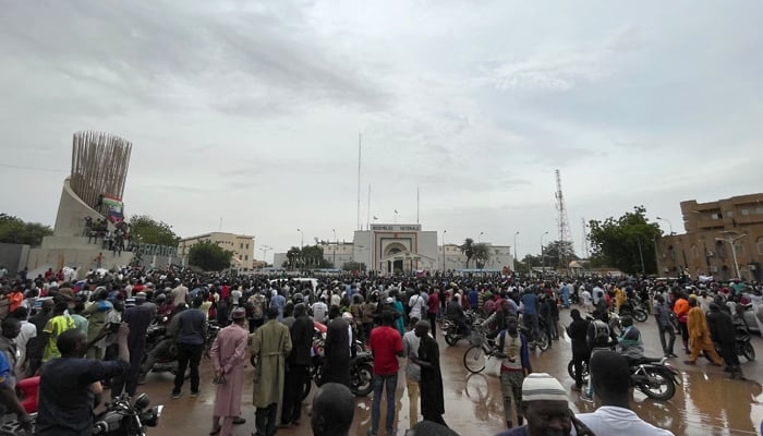 Supporters of the Nigerien defense and security forces gather during a demonstration outside the national assembly in Niamey on July 27, 2023. — AFP