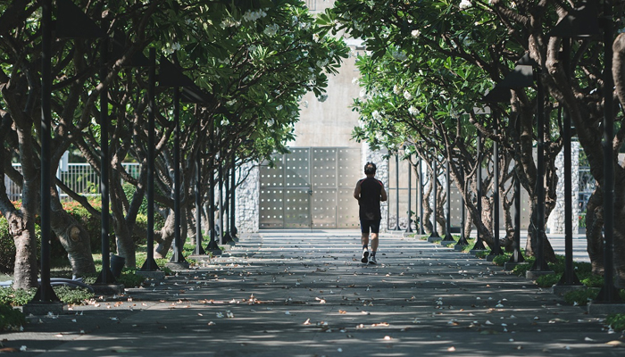 A person can be seen jogging on a track. — Pixabay/File