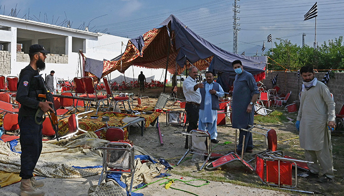 Security personnel examine the site of a bomb blast in Bajaur district of Khyber-Pakhtunkhwa province on July 31, 2023. — AFP