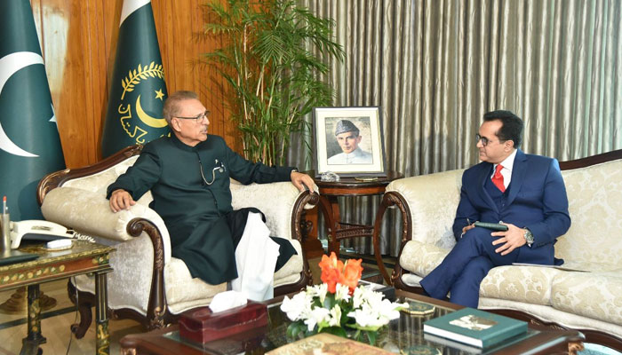 President Arif Alvi with Pakistan’s Ambassador-Designate to Iran Mudassir Tipu. — President’s Secretariat