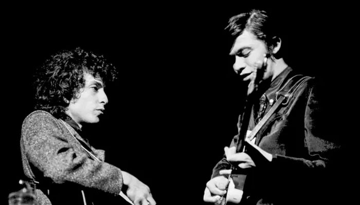 Robbie Robertson played as a backup artist for Bob Dylan in the mid-1960s