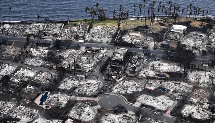 An aerial image taken on August 10, 2023 shows destroyed homes and buildings burned to the ground in Lahaina in the aftermath of wildfires in western Maui, Hawaii. — AFP