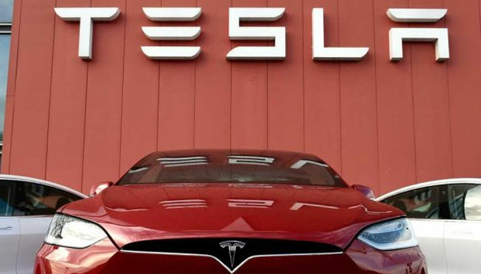 The logo marks the showroom and service center for the US automotive and energy company Tesla in Amsterdam. — AFP/File
