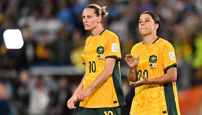Australia´s Emily Van Egmond and Sam Kerr react after their defeat from England during the Australia and New Zealand 2023 Women´s World Cup semi-final football match at Stadium Australia in Sydney on August 16, 2023. — AFP