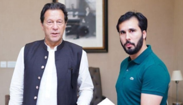 Hassaan Niazi (right) is photographed here with his uncle and PTI Chairman Imran Khan. — Twitter/@PTIOfficial