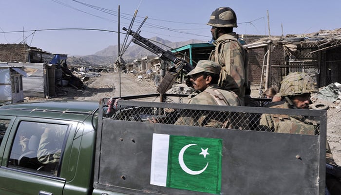 Pakistani soldiers patrol in Sararogha town in South Waziristan, on November 17, 2009. — AFP