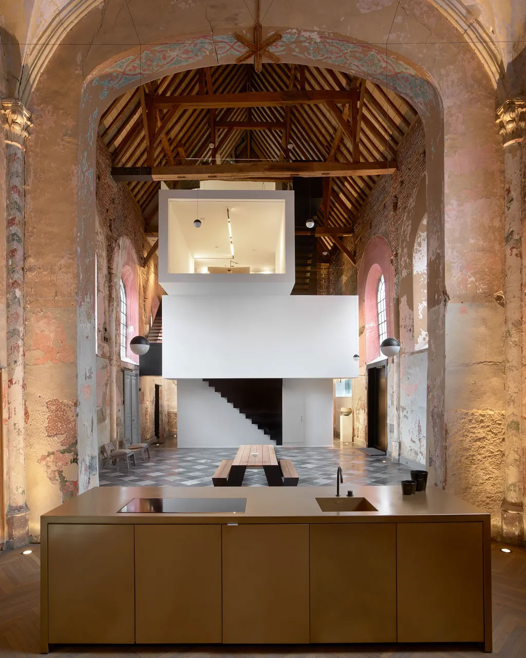 A chapel in Limburg, Belgium has become a studio for architecture firm Klaarchitectuur. — Toon Grobet/ Frozen Moments