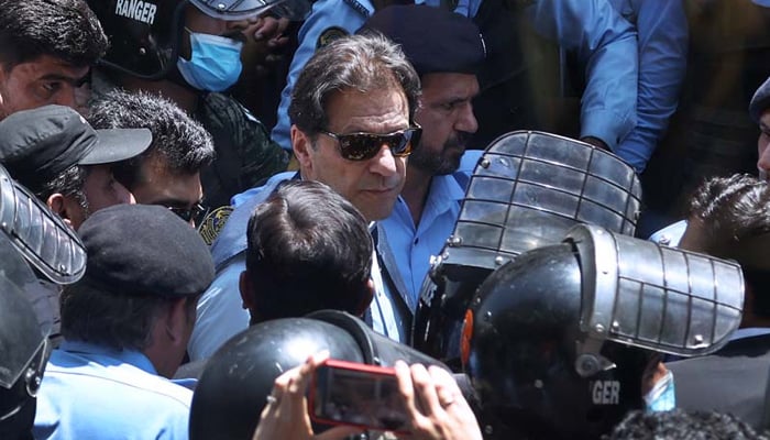 PTI Chairman Imran Khan arrives to appear at Islamabad High Court on May 9, 2023. — APP/File