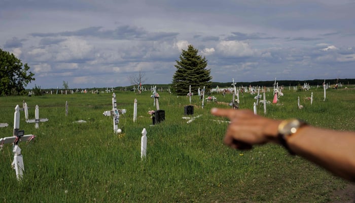 This photo taken on June 8, 2022 shows where unmarked graves have been found in Saddle Lake Cemetery in Saddle Lake Cree Nation in Alberta. — AFP