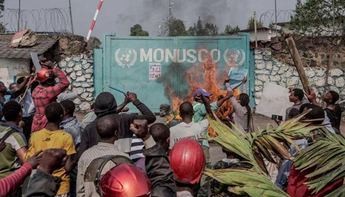 Protesters set fire in front of United Nations Mission for the Stabilisation of Congo Headquarters in Goma, DRC. — AFP