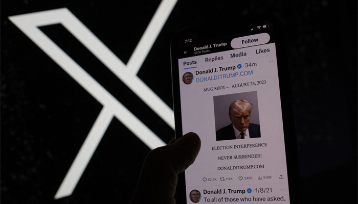 This illustration photo shows former US President Donald Trumps mugshot on X — formerly Twitter on August 24, 2023. — AFP