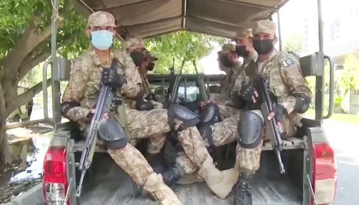 Pakistan Army troops can be seen in a military vehicle in this photo taken on July 16, 2022. — ISPR