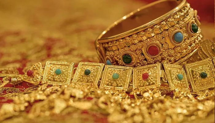 An updated image of gold jewellery displayed at a store. — AFP