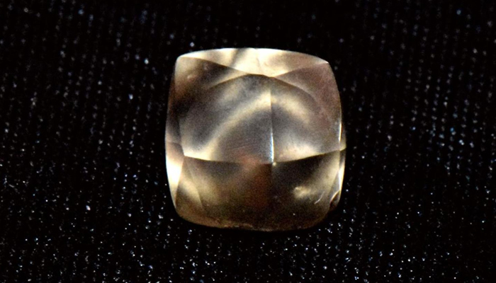 In this picture obtained on September 9, 2023, shows a golden brown diamond discovered by a 7-year-old in Arkansas at Crater of Diamonds State Park in Murfreesboro. — Arkansas State Parks website