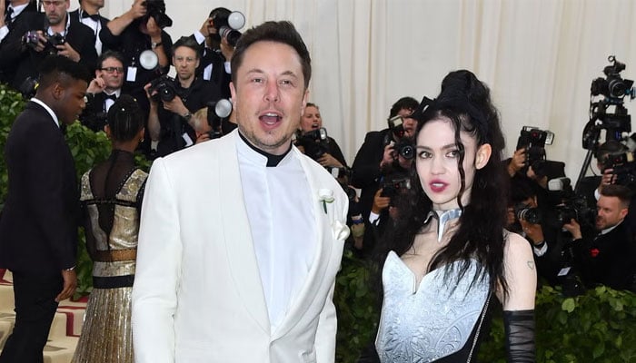 Tesla and SpaceX CEO Elon Musk and musician Grimes arrive at Met Gala on May 7, 2018. — AFP/File