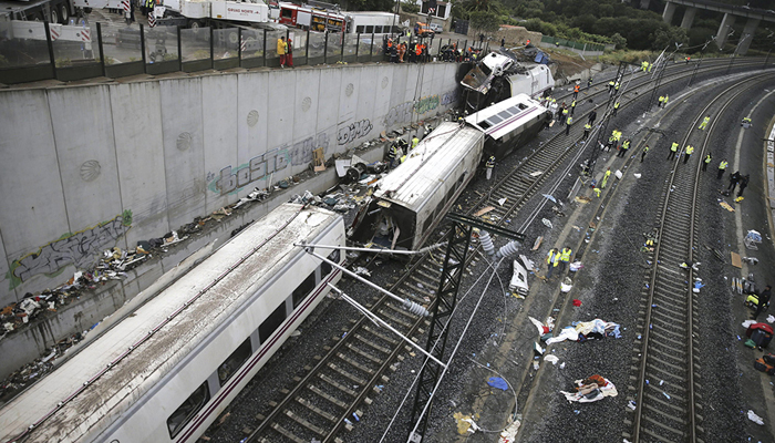 This photograph shows the Alvia high-speed train the day after it derailed and crashed into a concrete wall, four kilometers before Santiago de Compostela. — AFP/File