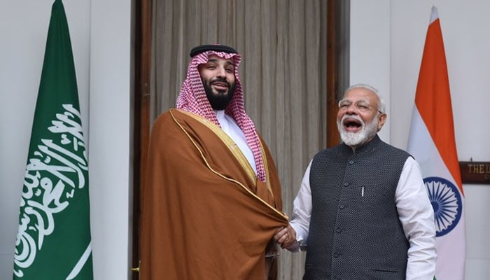 Indian Prime Minister Narendra Modi (R) shakes hands with Saudi Crown Prince Mohammed bin Salman prior to a meeting at Hyderabad House in New Delhi on February 20, 2019. — AFP