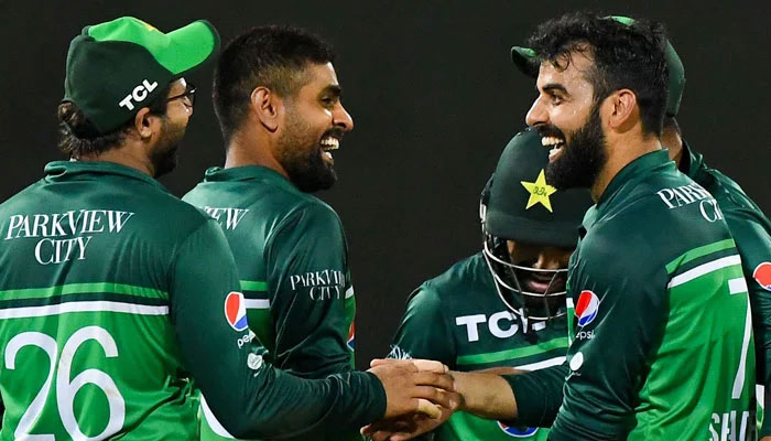 Pakistan´s captain Babar Azam (second left) celebrates with teammates after the dismissal of Afghanistan´s Hashmatullah Shahidi (not pictured) during the third and final ODI cricket match between Pakistan and Afghanistan at the R. Premadasa Stadium in Colombo on August 26, 2023. — AFP