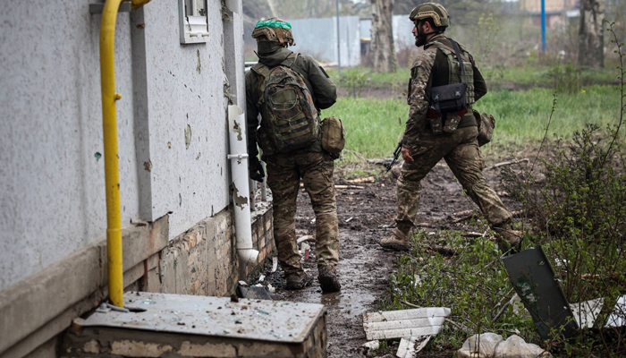 Ukrainian soldiers while gaining a secure position before combat in Ukraine amid the Russia-Ukraine war. — AFP/File