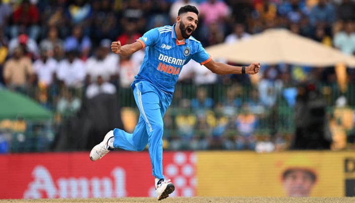Indias Mohammed Siraj celebrates after taking the wicket of Sri Lankas Dhananjaya de Silva during the Asia Cup 2023 final one-day international (ODI) cricket match between Sri Lanka and India at the R. Premadasa Stadium in Colombo on September 17, 2023. — AFP