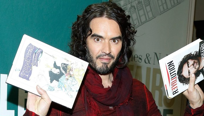 Russell Brand’s publisher halts all future book deals amid sexual assault claims