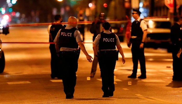 Chicago Police officers investigate the scene of a shooting in Chicago, Illinois. — AFP/File