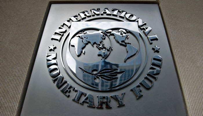 A logo is seen outside the headquarters of the International Monetary Fund on June 30, 2015 in Washington, DC.— AFP
