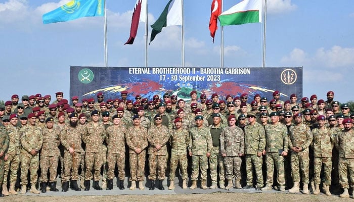 Chief of Army Staff (COAS) General Syed Asim Munir (C) poses for a group photo with the participants of Eternal Brotherhood-II on September 19, 2023. — ISPR