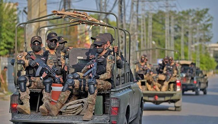 Pakistan army commandos depart in their vehicles in Rawalpindi on September 13, 2021. — AFP
