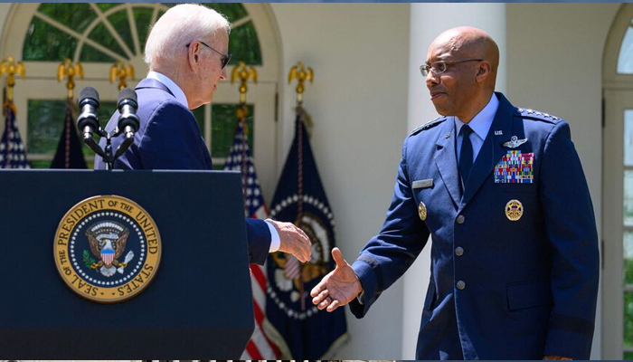US President Joe Biden shakes hands with Air Force Gen. Charles Brown, Jr. (R), after nominating him to serve as the next chairman of the Joint Chiefs of Staff, in the Rose Garden of the White House, Washington, May 25, 2023. — AFP