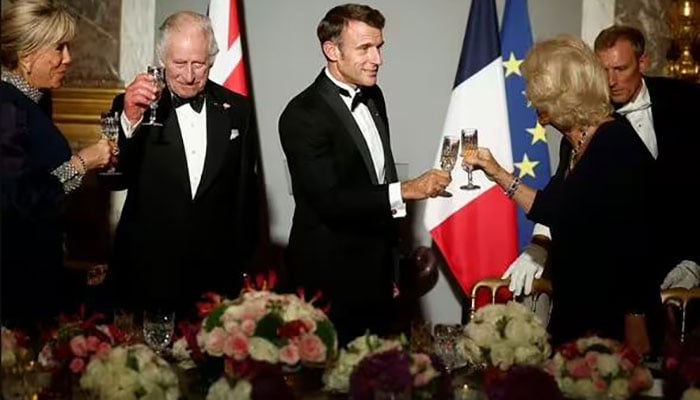King Charles and Queen Camilla pictured with French President Emmanuel Macron and his wife Brigitte
