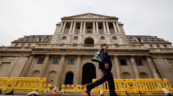 Bank of England holds rate after 14 straight hikes as inflation hits brakes